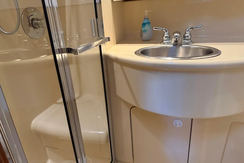 Slide: The Image of Bathroom interior of 2005 Meridian 341 Sedan yacht with sink and shower. - 20