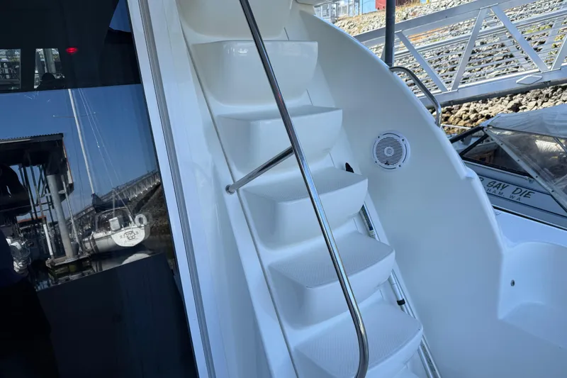 Slide: The Image of Staircase on 2005 Meridian 341 Sedan yacht with dockside view. - 28
