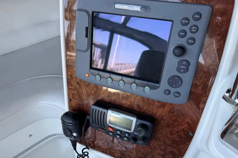 Slide: The Image of Control panel of a 2005 Meridian 341 Sedan with navigation and communication devices. - 31