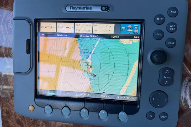 Slide: The Image of Raymarine E80 navigation display on 2005 Meridian 341 Sedan boat, showing nautical chart. - 32
