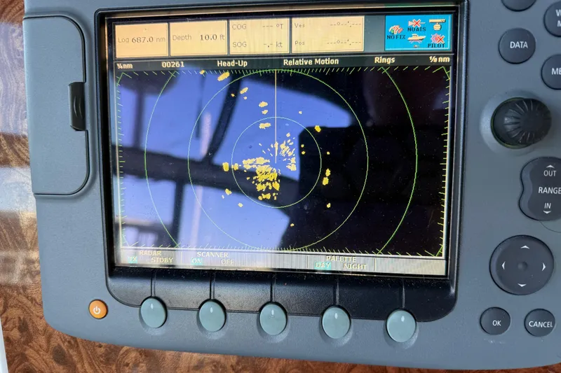 Slide: The Image of Radar display on a 2005 Meridian 341 Sedan boat, showing navigation data. - 33