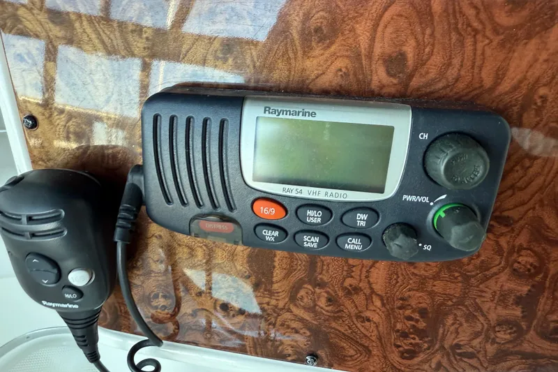 Slide: The Image of Raymarine VHF radio on 2005 Meridian 341 Sedan boat dashboard. - 34