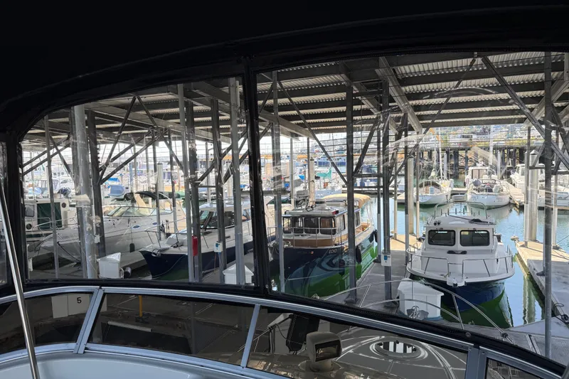 Slide: The Image of Boats docked in a marina, viewed from a 2005 Meridian 341 Sedan. - 40