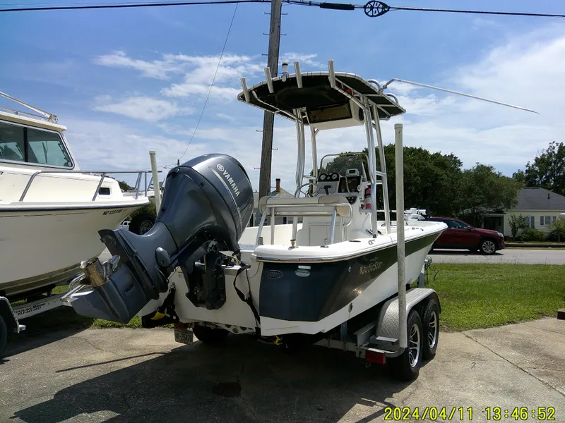Slide: The Image of 2017 NauticStar 2140 Sport boat with Yamaha outboard motor on trailer. - 2