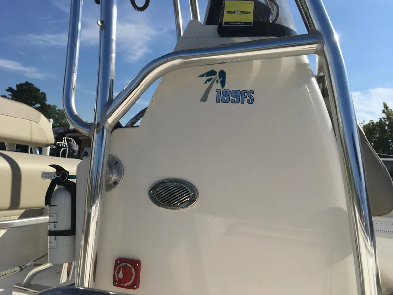Slide: The Image of 2023 Key West 189 FS boat console with safety equipment and logo. - 11