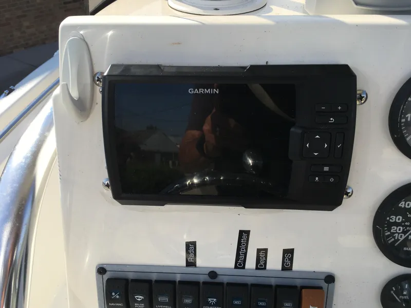 Slide: The Image of Garmin navigation system on 2023 Key West 189 FS boat dashboard. - 15