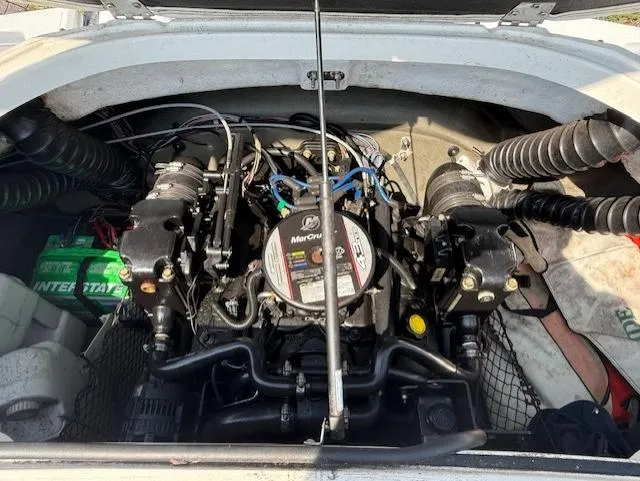 Slide: The Image of Engine compartment of a 2011 Larson LX 850 boat with MerCruiser engine. - 11