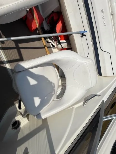 Slide: The Image of White seat on 2011 Larson LX 850 boat deck with life jackets. - 9