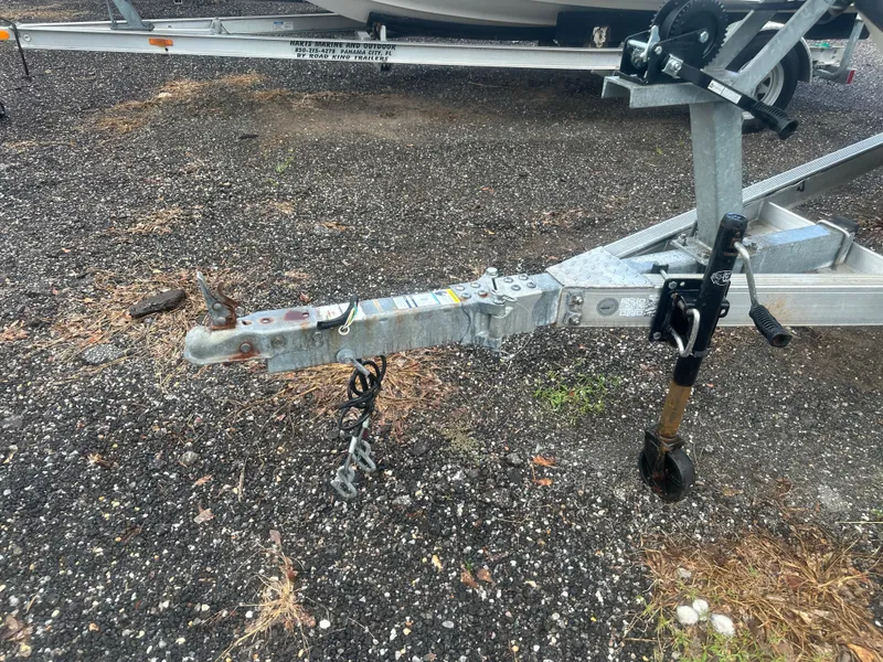 Slide: The Image of Trailer hitch of a 2015 NauticStar 1810 NauticBay on gravel surface. - 25