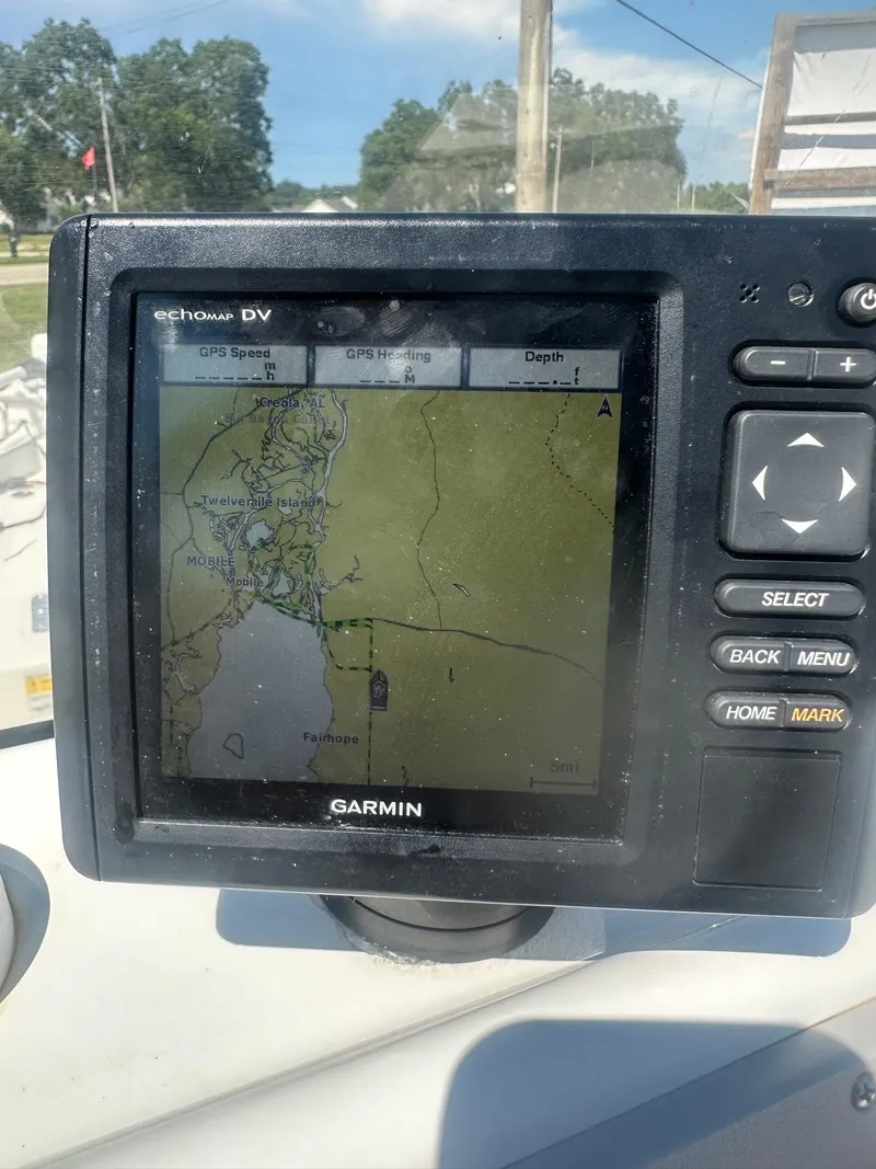 Slide: The Image of Garmin GPS on 2015 NauticStar 1810 NauticBay displaying a coastal map. - 29