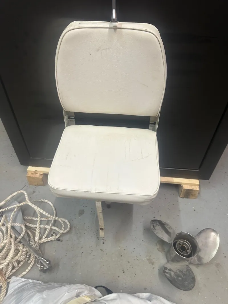 Slide: The Image of White boat seat with rope and propeller, 2015 NauticStar 1810 NauticBay accessories. - 32