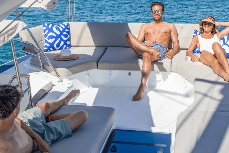 Slide: The Image of People relaxing on a 2026 Fountaine Pajot 44 yacht, enjoying the sun and sea. - 8