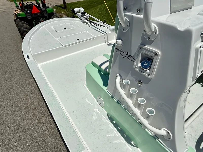 Slide: The Image of 2023 Shallow Sport 24 Sport boat, featuring sleek design and modern controls. - 11