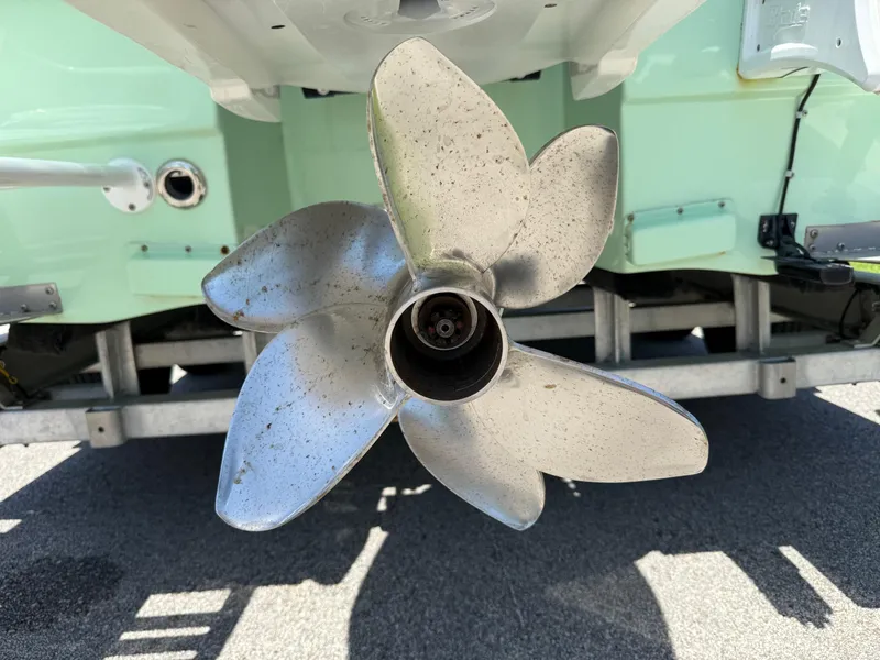 Slide: The Image of Close-up of a 2023 Shallow Sport 24 Sport boat propeller on a trailer. - 18