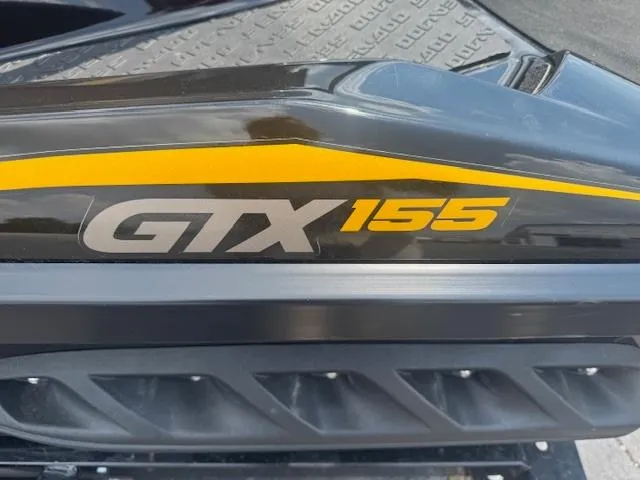 Slide: The Image of 2017 Sea-Doo GTX 155 jet ski with yellow and black design details. - 2
