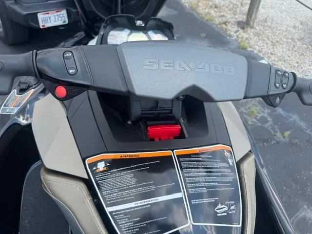 Slide: The Image of 2017 Sea-Doo GTX 155 dashboard with controls and warning labels. - 5