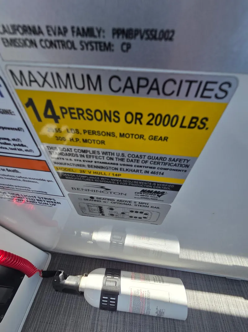 Slide: The Image of 2023 Bennington 25RTSB capacity label: 14 persons or 2000 lbs, 300 HP motor. - 10