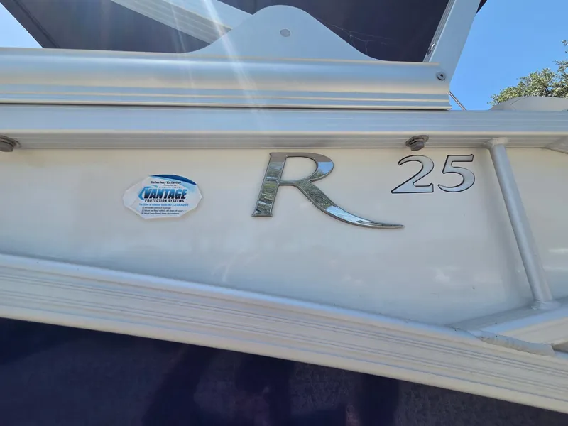Slide: The Image of 2023 Bennington 25RTSB boat exterior with Vantage Protection Systems label. - 4