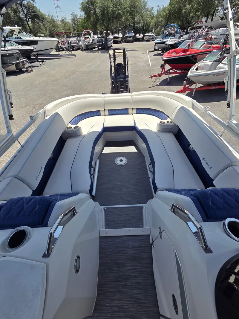 Slide: The Image of 2023 Bennington 25RTSB boat interior with spacious seating and modern design. - 5