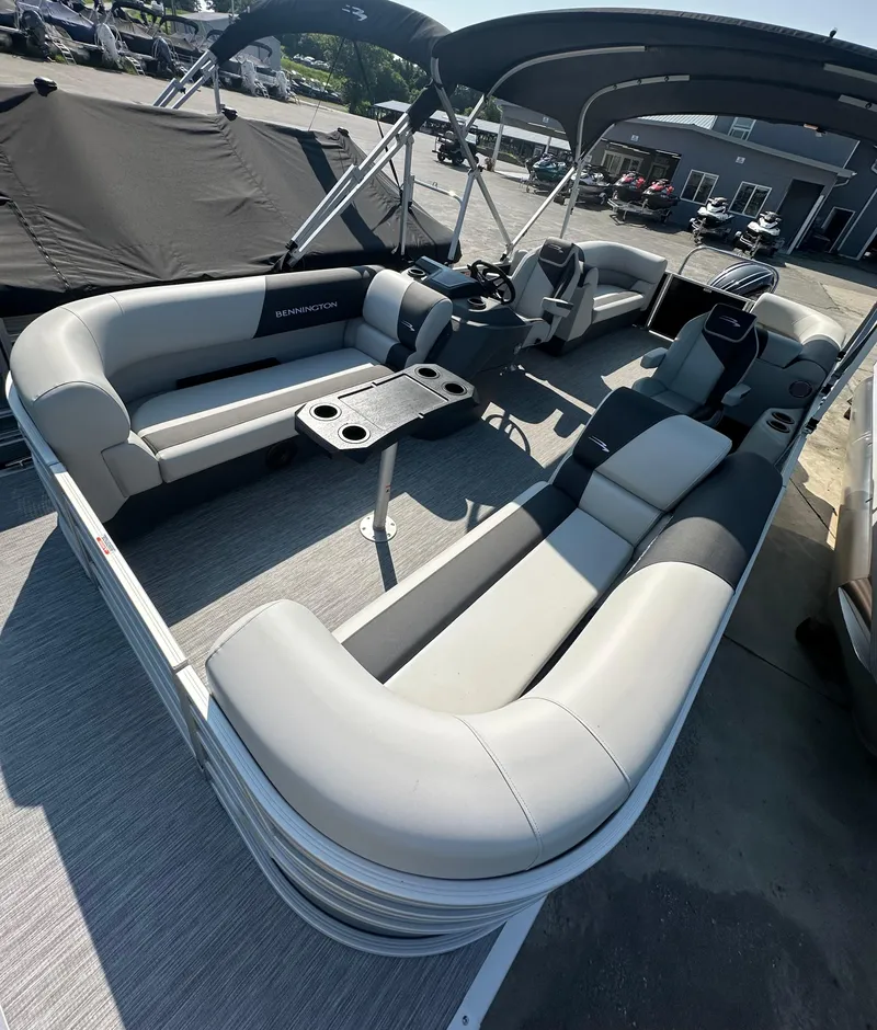 Slide: The Image of 2025 Bennington 22 SSRSE pontoon boat with spacious seating and modern design. - 5