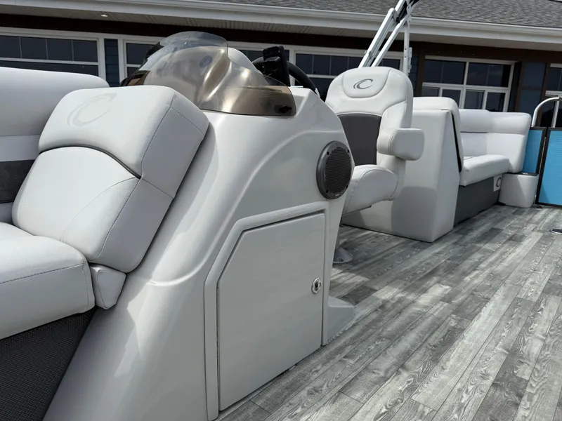 Slide: The Image of 2022 Crest 220 boat interior with modern seating and sleek design. - 14