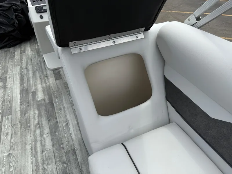 Slide: The Image of Interior of a 2022 Crest 220 boat showing seating and flooring details. - 29