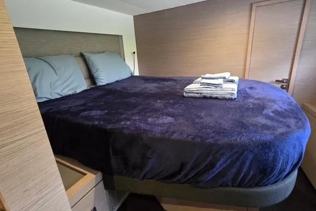 Slide: The Image of Luxurious bedroom in 2022 Fountaine Pajot Tanna 47 yacht with plush bedding. - 20