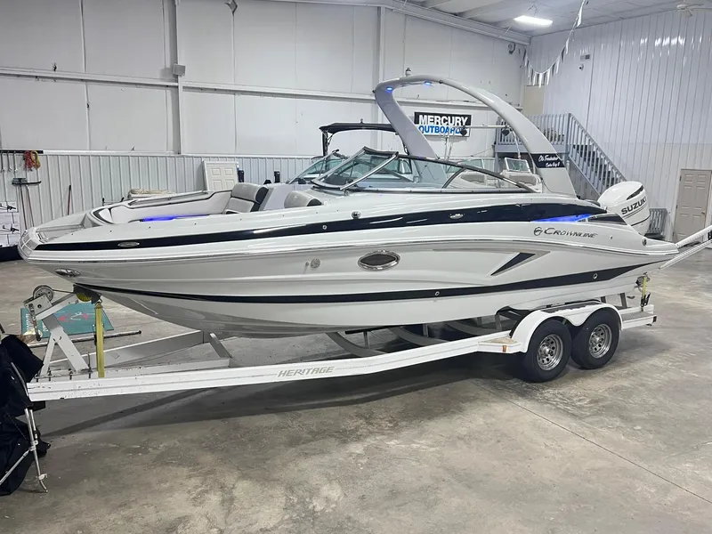 The Image of 2020 Crownline Eclipse E225 XS boat on trailer in indoor storage. - 0