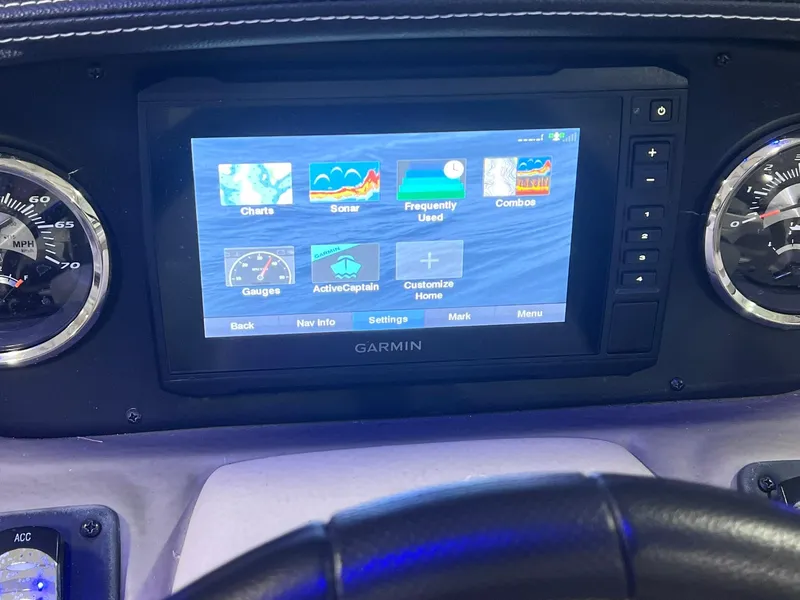Slide: The Image of Dashboard of 2020 Crownline Eclipse E225 XS with Garmin navigation display. - 28