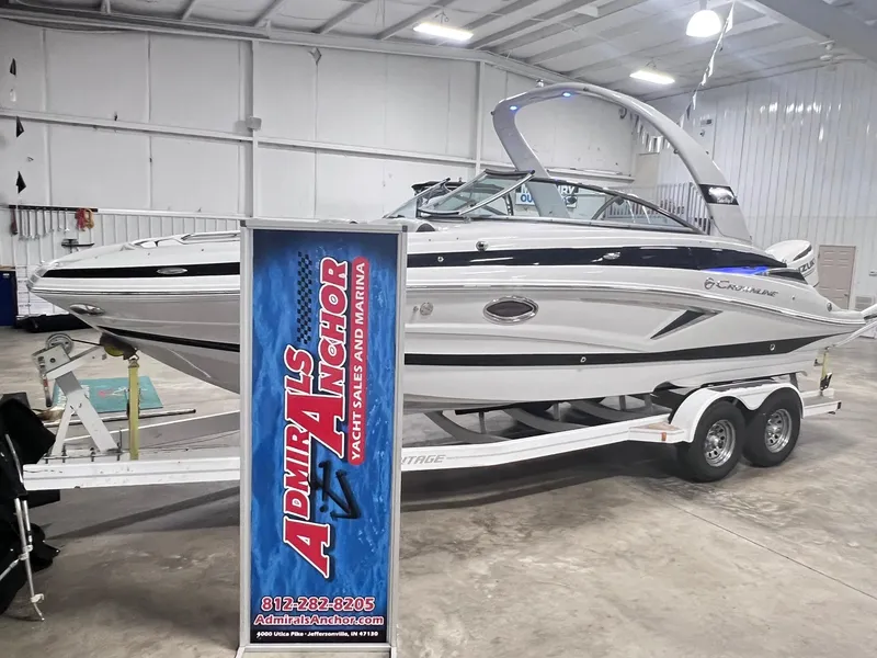 Slide: The Image of 2020 Crownline Eclipse E225 XS boat on trailer in showroom. - 4