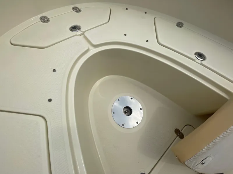 Slide: The Image of 2015 Chris-Craft Catalina 23 boat deck with storage compartments and seating. - 31