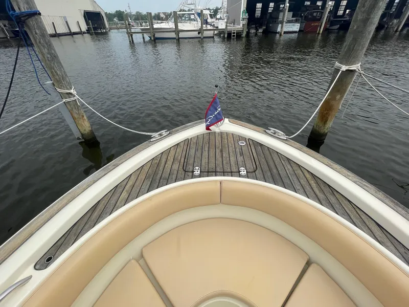 Slide: The Image of Bow view of 2015 Chris-Craft Catalina 23 docked at marina. - 33