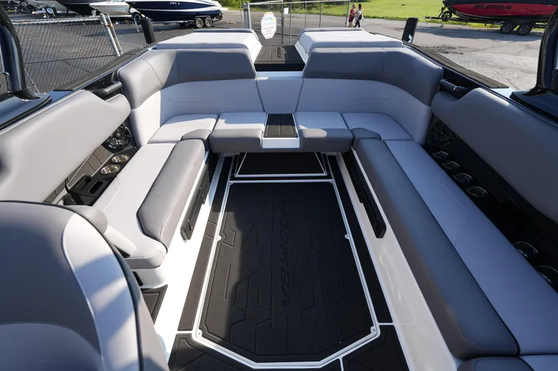 Slide: The Image of 2025 Moomba Max boat interior with spacious seating and modern design. - 11