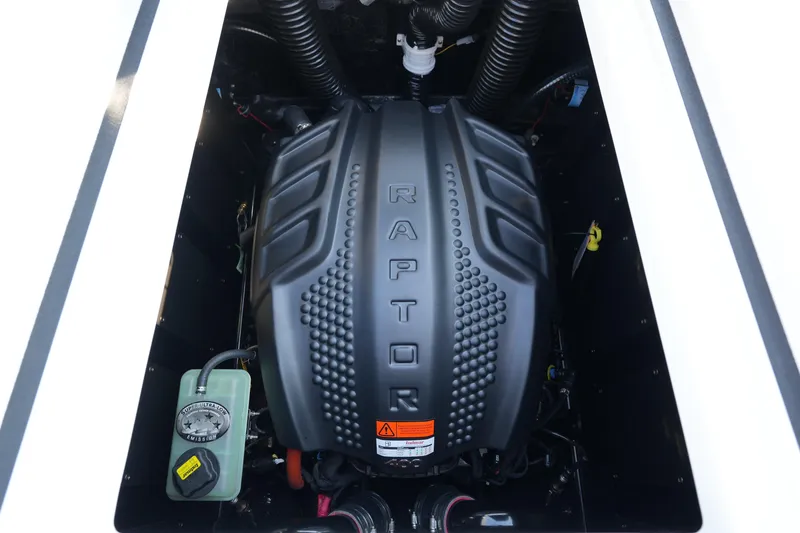 Slide: The Image of 2025 Moomba Max engine compartment featuring a Raptor engine. - 14