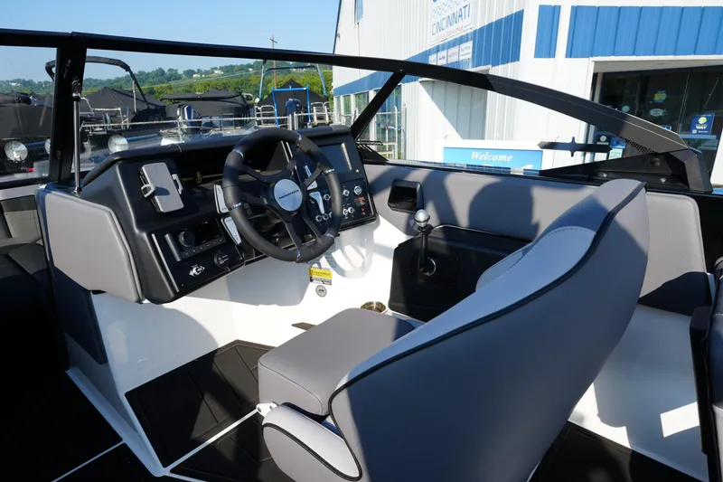 Slide: The Image of 2025 Moomba Max boat interior with modern dashboard and steering wheel. - 8