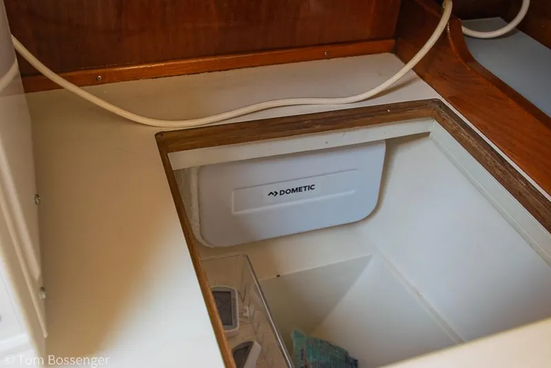 Slide: The Image of Built-in Dometic refrigerator in 1987 Catalina 36 yacht interior. - 13