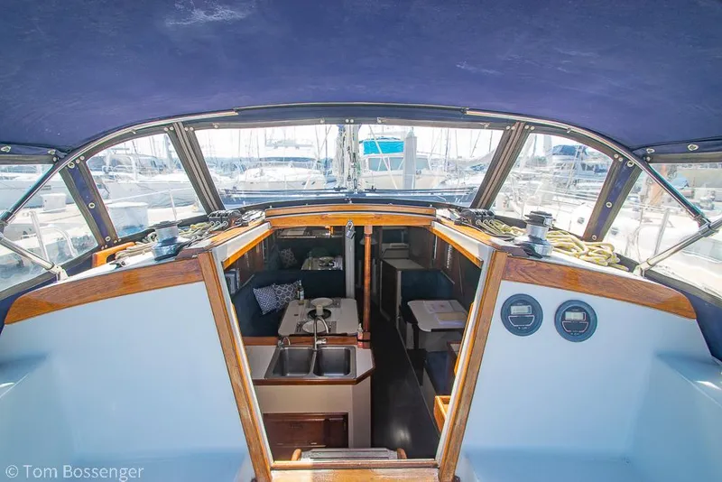 Slide: The Image of Interior view of 1987 Catalina 36 sailboat cockpit and cabin entrance. - 36