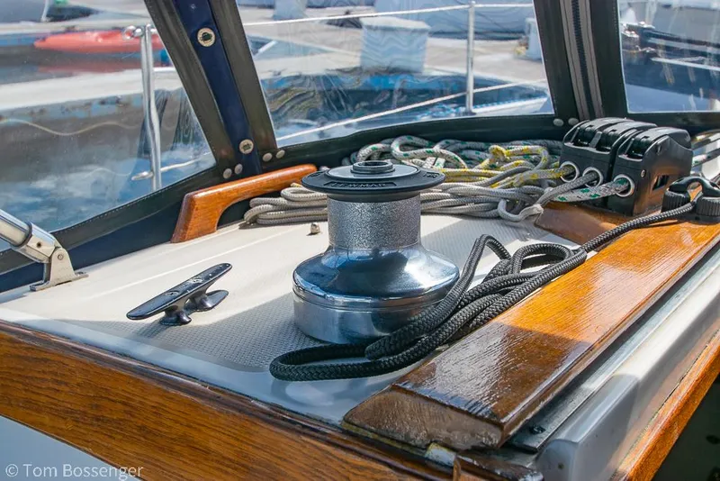 Slide: The Image of Close-up of a 1987 Catalina 36 sailboat deck with winch and ropes. - 39