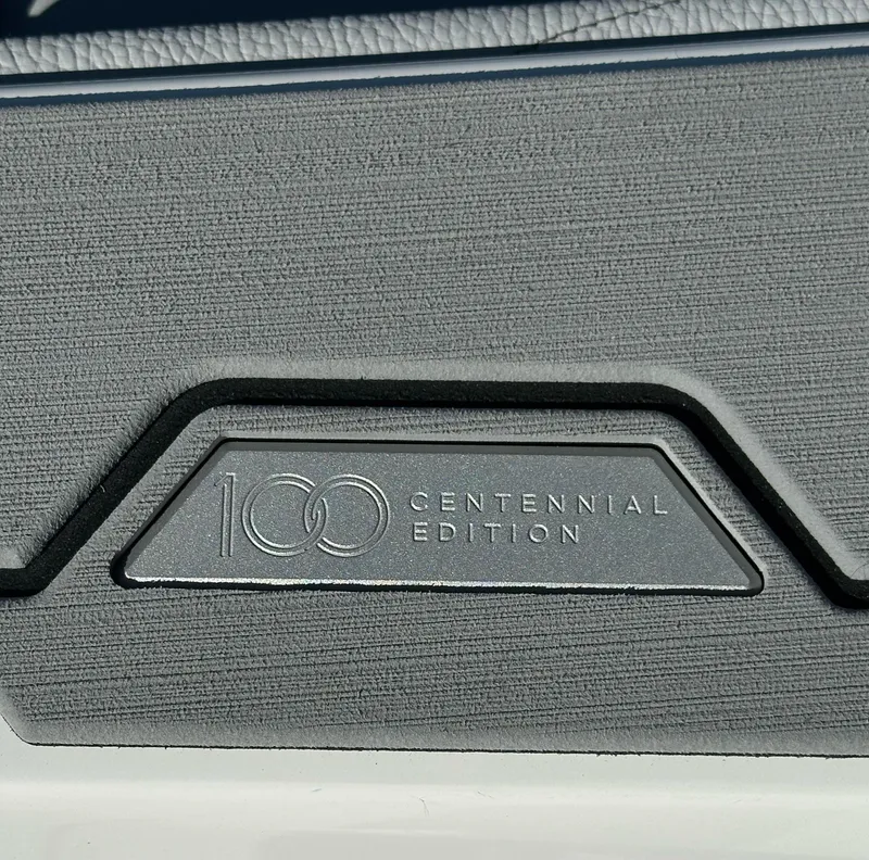 Slide: The Image of 2025 Nautique Super Air Nautique G23 Centennial Edition badge, gray textured background. - 11