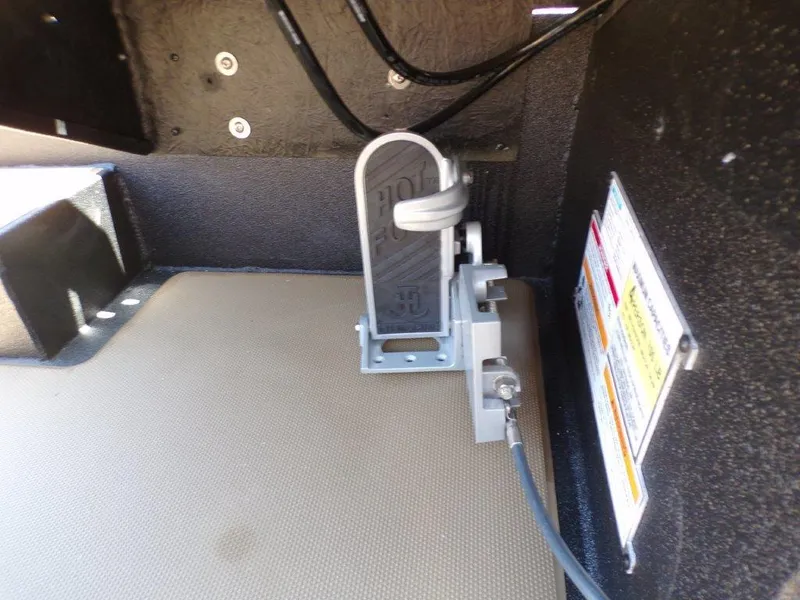 Slide: The Image of Foot pedal mechanism in 2026 Xpress H20 Bass boat interior. - 23