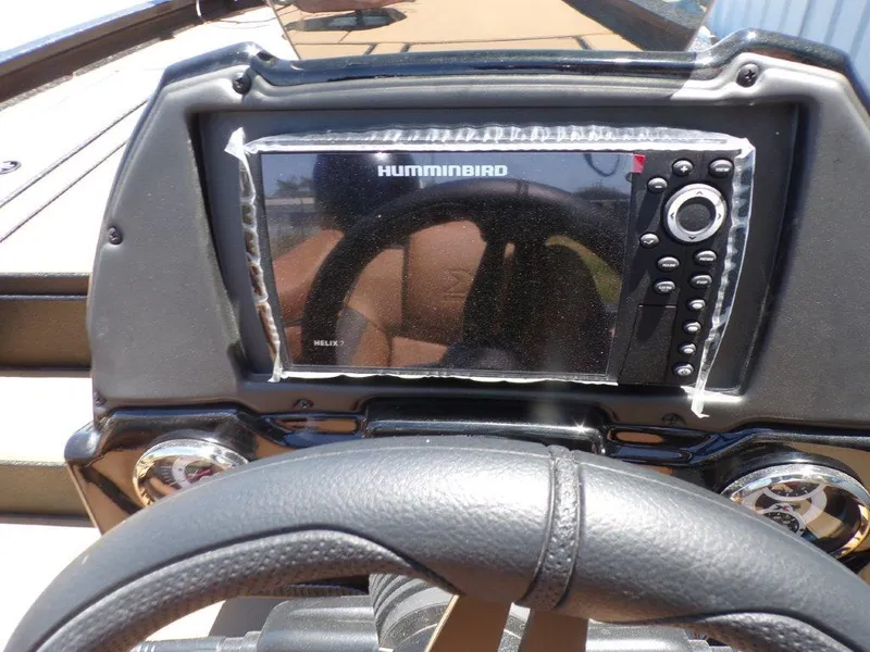 Slide: The Image of Dashboard of 2026 Xpress H20 Bass boat with Humminbird Helix 7 display. - 24