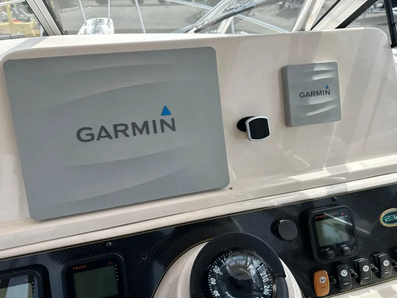 Slide: The Image of Dashboard of 2014 Grady-White 232 Gulfstream with Garmin navigation equipment. - 11