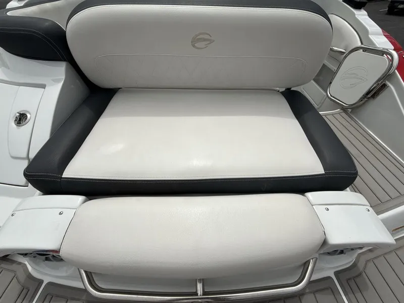 Slide: The Image of 2022 Crownline Eclipse E235 SURF boat seat with white and black upholstery. - 19