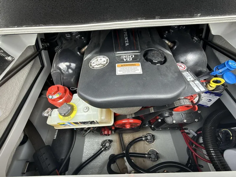 Slide: The Image of 2022 Crownline Eclipse E235 SURF engine compartment with Volvo Penta 350 V8 engine. - 20