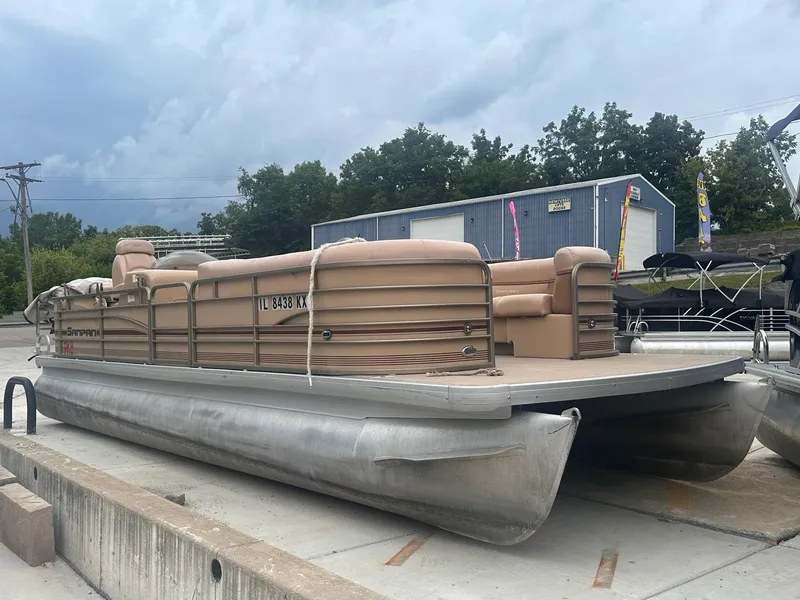 The Image of 2008 Godfrey Sanpan 2500 RE pontoon boat parked outdoors on concrete. - 0