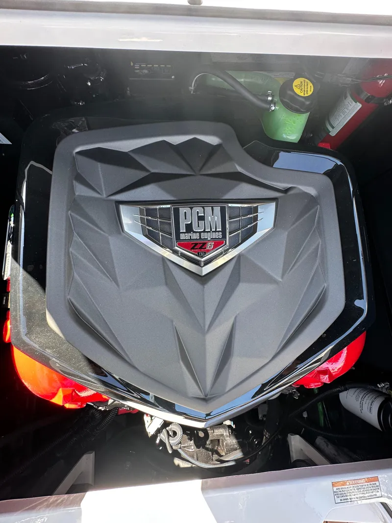 Slide: The Image of Engine compartment of 2025 Nautique Super Air Nautique S23 with PCM marine engine. - 17