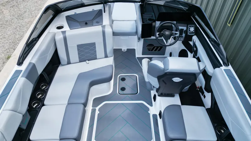 Slide: The Image of 2025 Malibu Wakesetter 23 LSV interior with modern seating and sleek design. - 15
