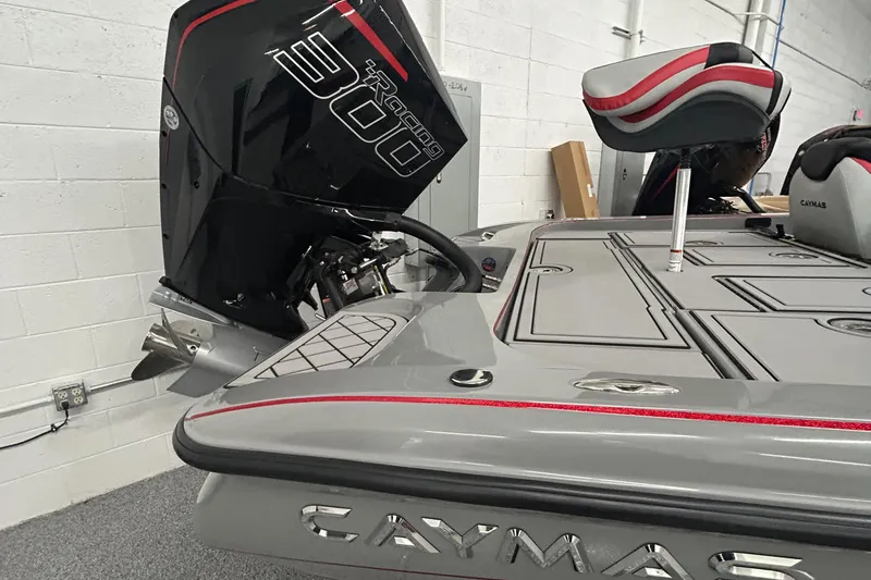 Slide: The Image of 2025 Caymas XS 21 Pro boat with powerful engine, sleek design, and comfortable seating. - 3