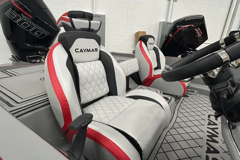 Slide: The Image of 2025 Caymas XS 21 Pro boat interior with stylish seats and powerful engine. - 5