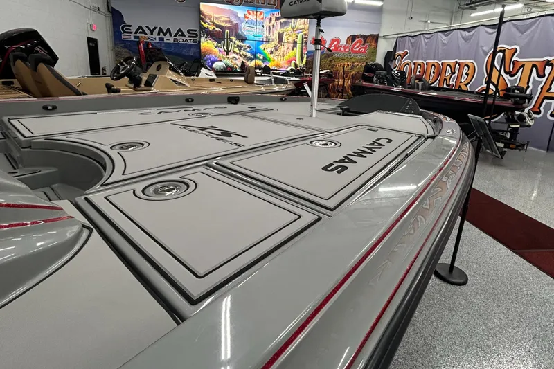 Slide: The Image of 2025 Caymas XS 21 Pro boat interior with sleek design and storage compartments. - 6